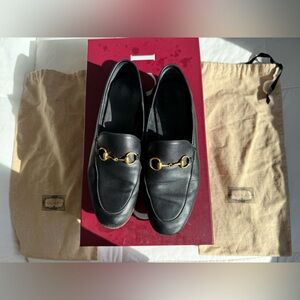 Gucci Black Leather Loafers with Gold Accents